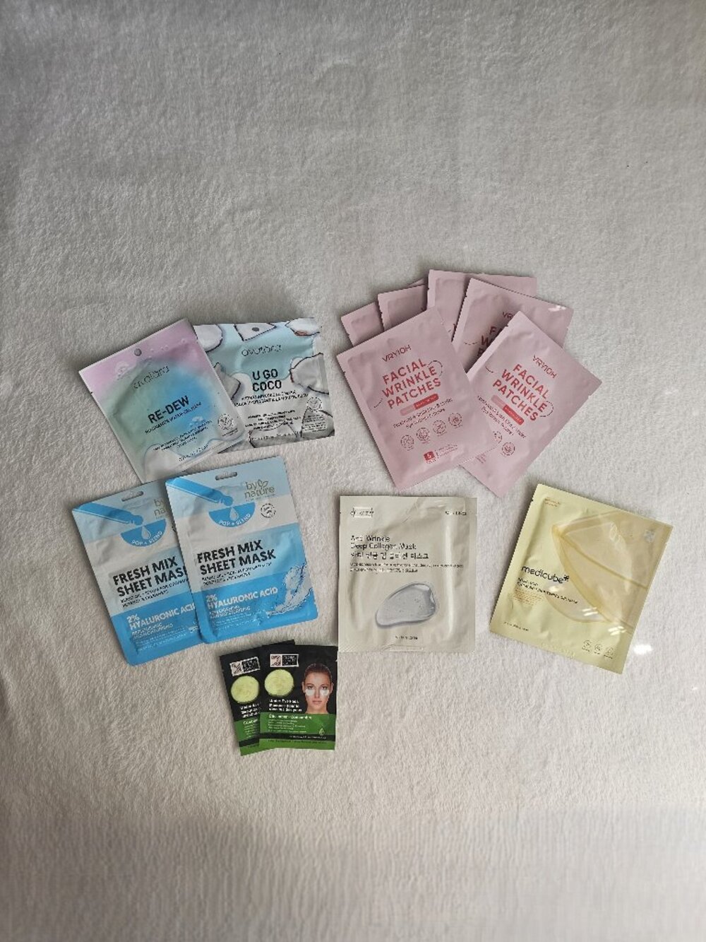 Assortment of facial sheet masks, hydrogel masks, and wrinkle patches